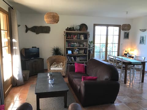 Top performing Airbnb: Leccia Rossa house in its green setting in Sotta