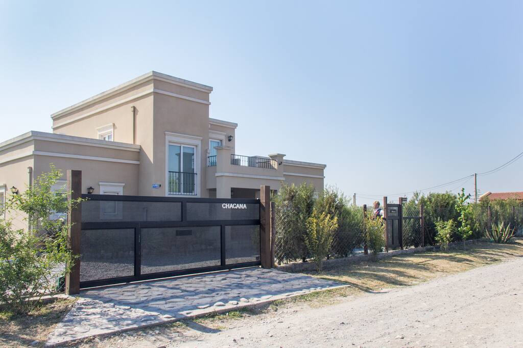 Front car gate and host's house