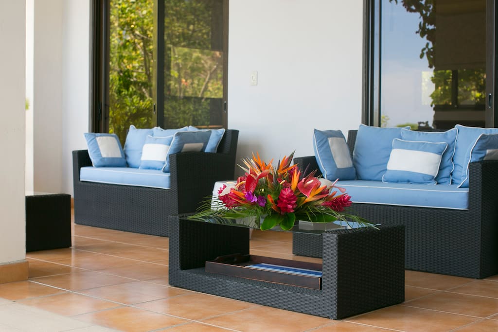 Pool terrace, with lots of comfortable seating areas - watch the hummingbirds in the garden & the kids in the pool!