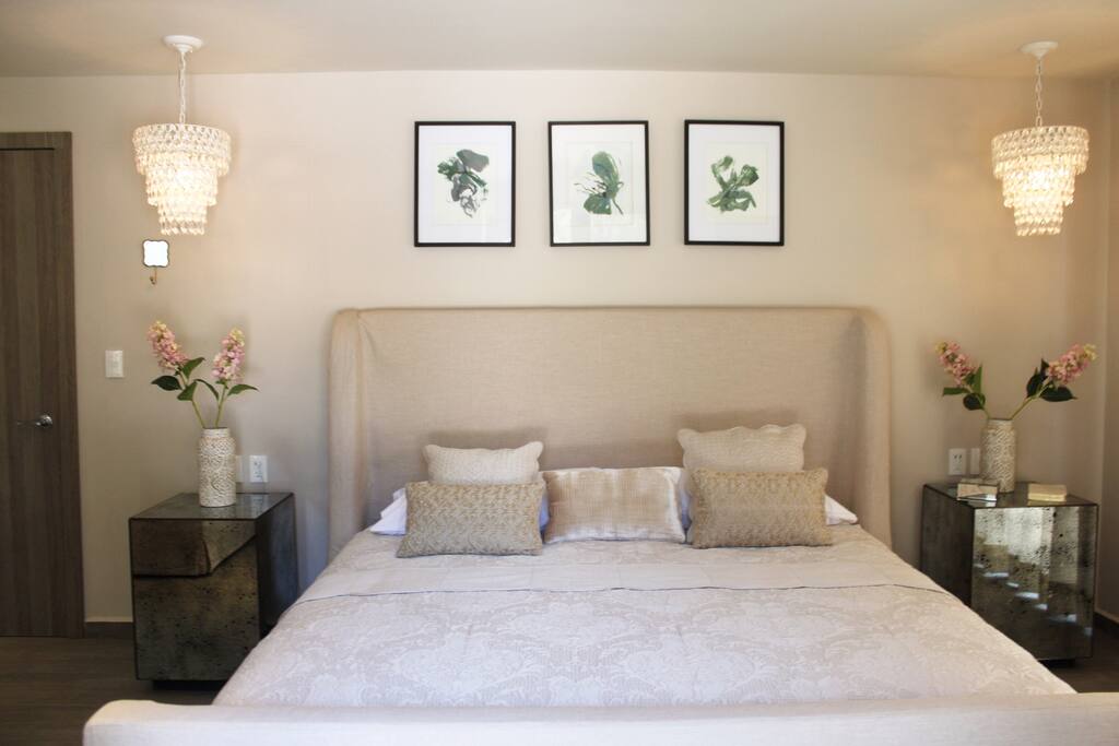 Master Bedroom with King size bed, Sofa & Bathroom.
