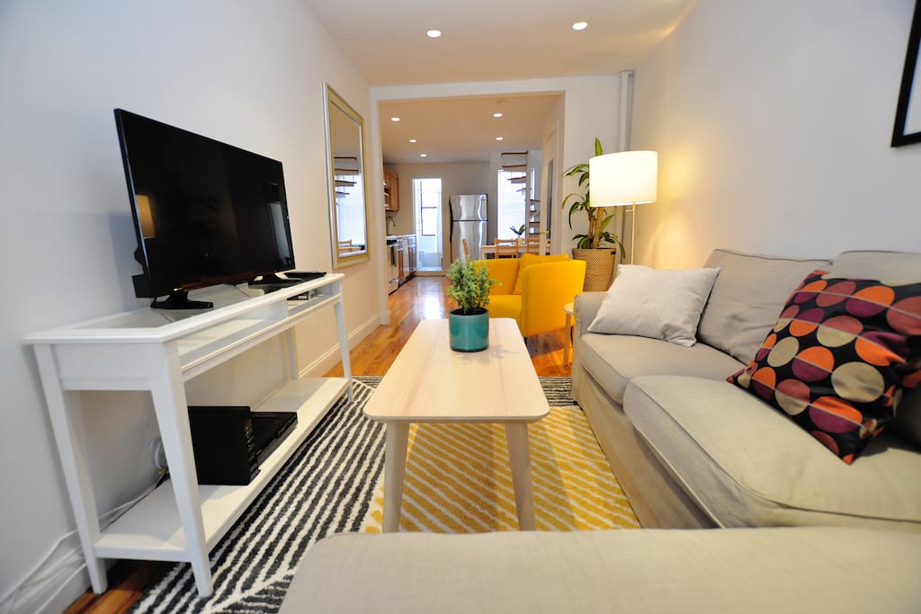 Relax in style in the newly furnished living room of our duplex two bedroom apartment.