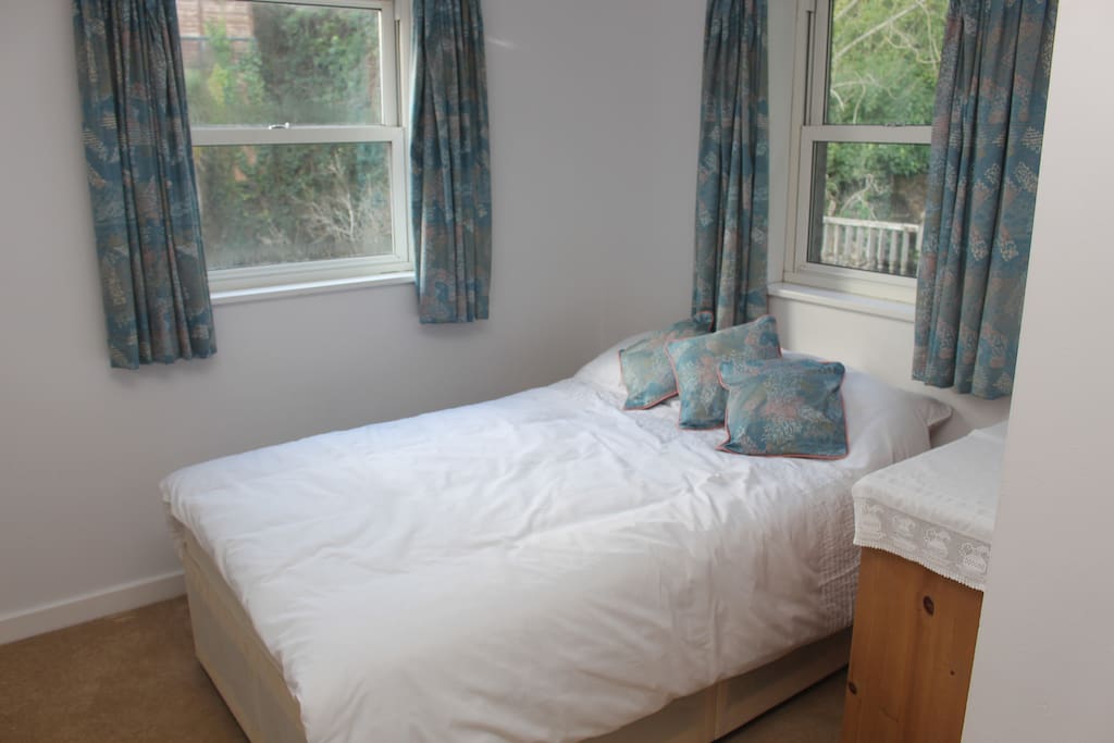 Main Bedroom 4ft Double Bed, Room includes chest of drawers and wardrobe.