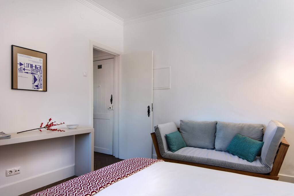 A sofa in the bedroom