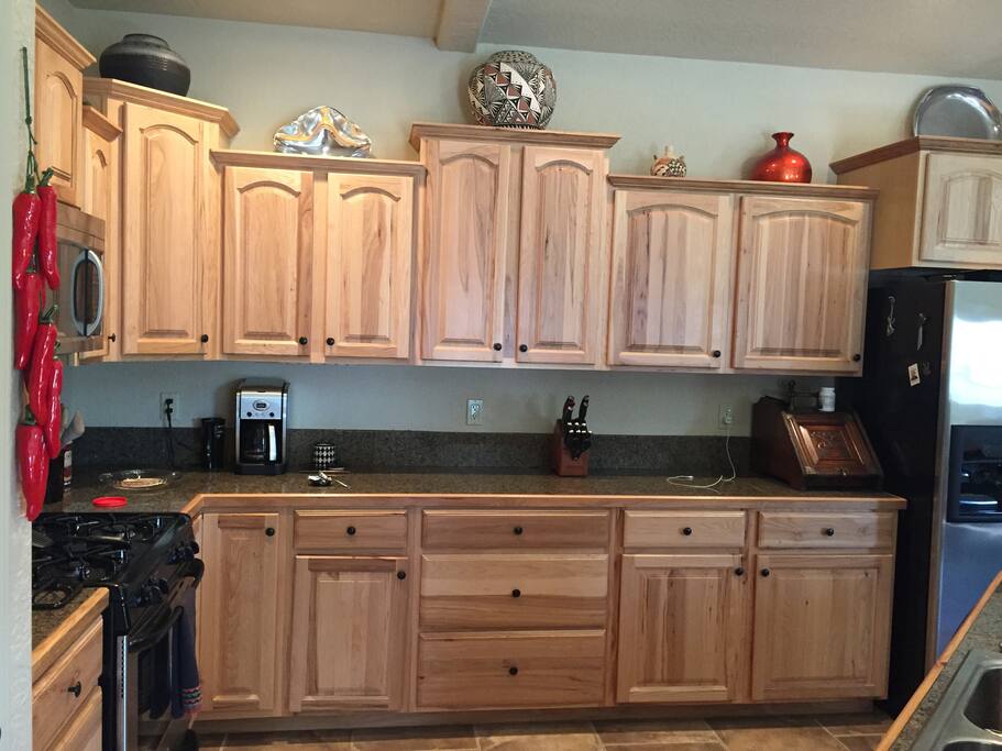 Fully stocked chef's kitchen.