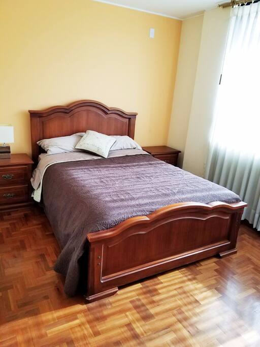Comfortable full size bed with abundant closet space.