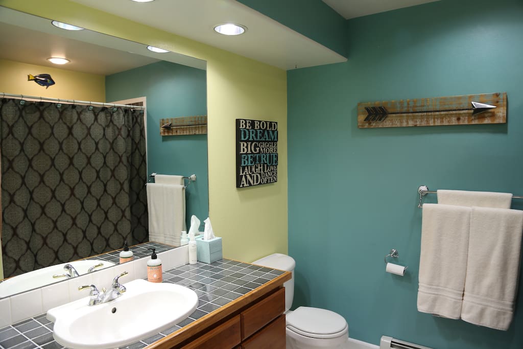 Bathroom with tub and shower.