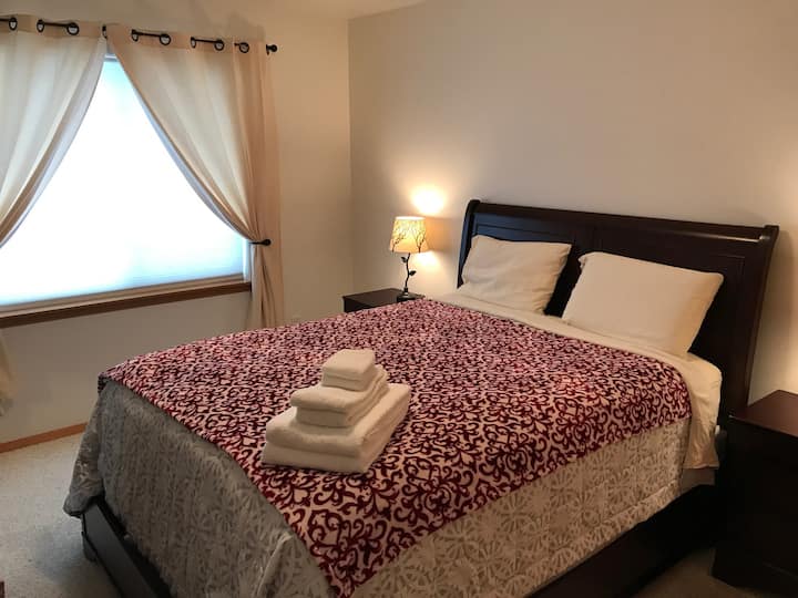 Cassiar private room with queen bed, window with a view