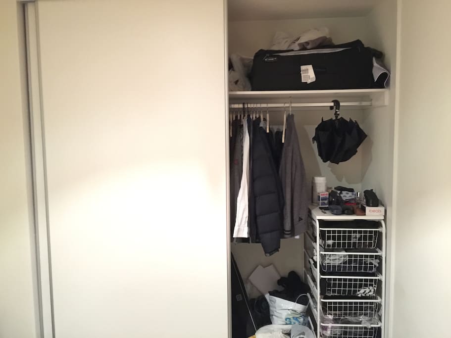 Sliding door wardrobe with clothing rack