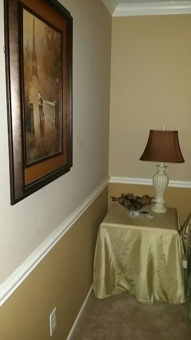 Your bedroom with night stand and lamp.