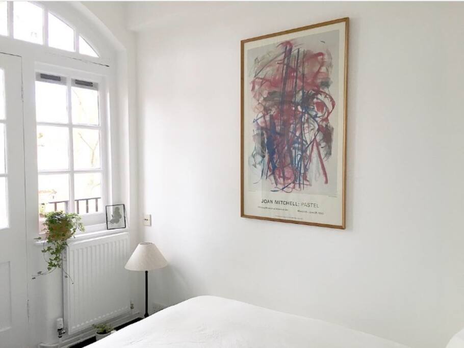 Joni Mitchell next to Bed.