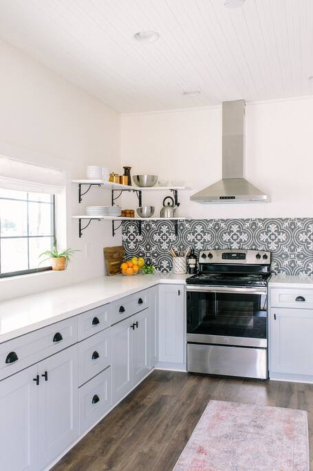 Each kitchen is supplied with cooking essentials such as olive oils and spices.
