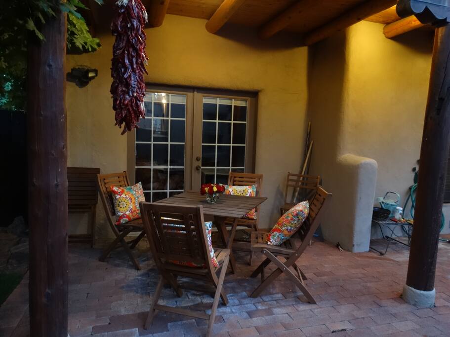 Comfortable patio. French doors lead into living room.