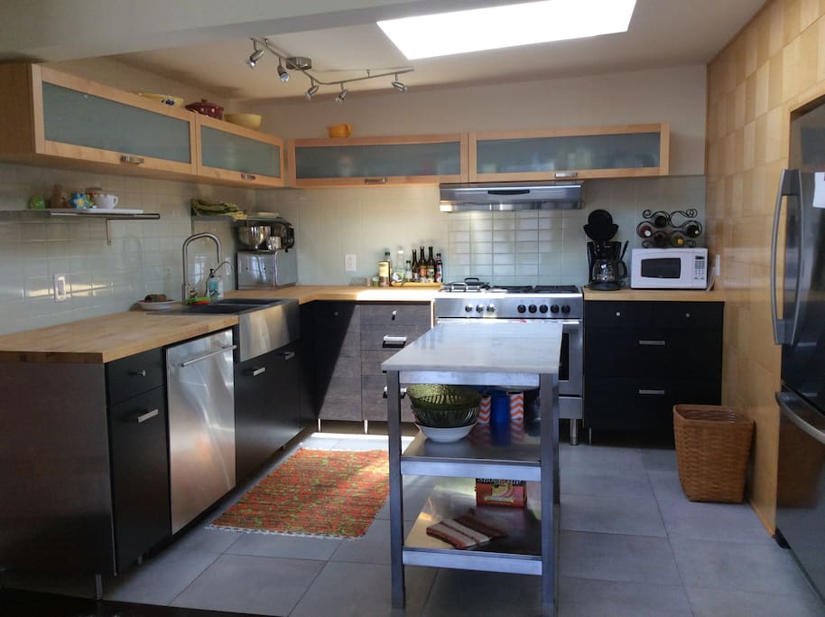 Updated kitchen, dishwasher, gas convection oven, full size refrigerator.