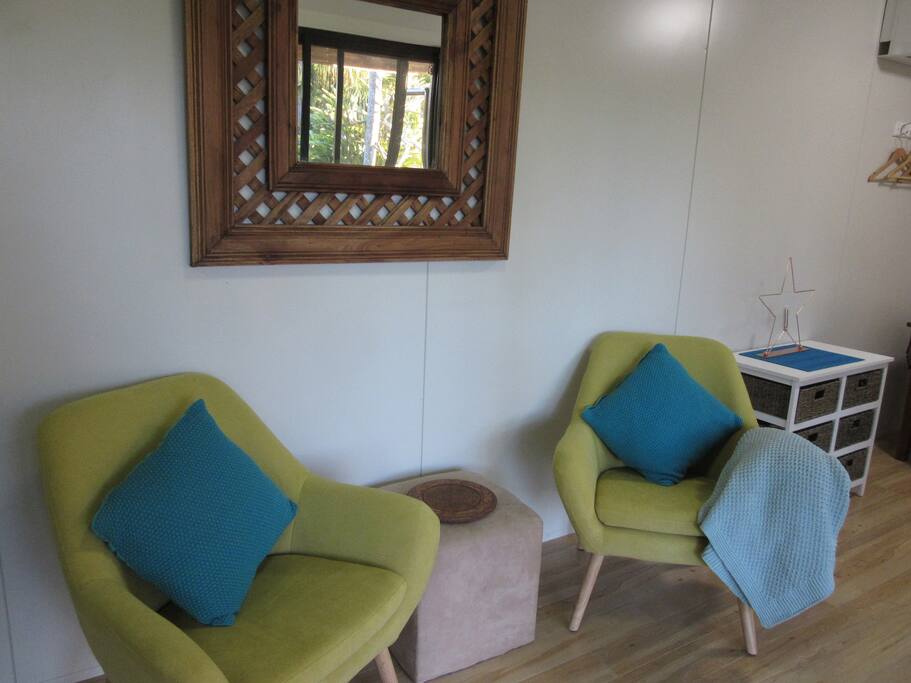 Comfy chairs to look out towards the pool, read a book or watch TV