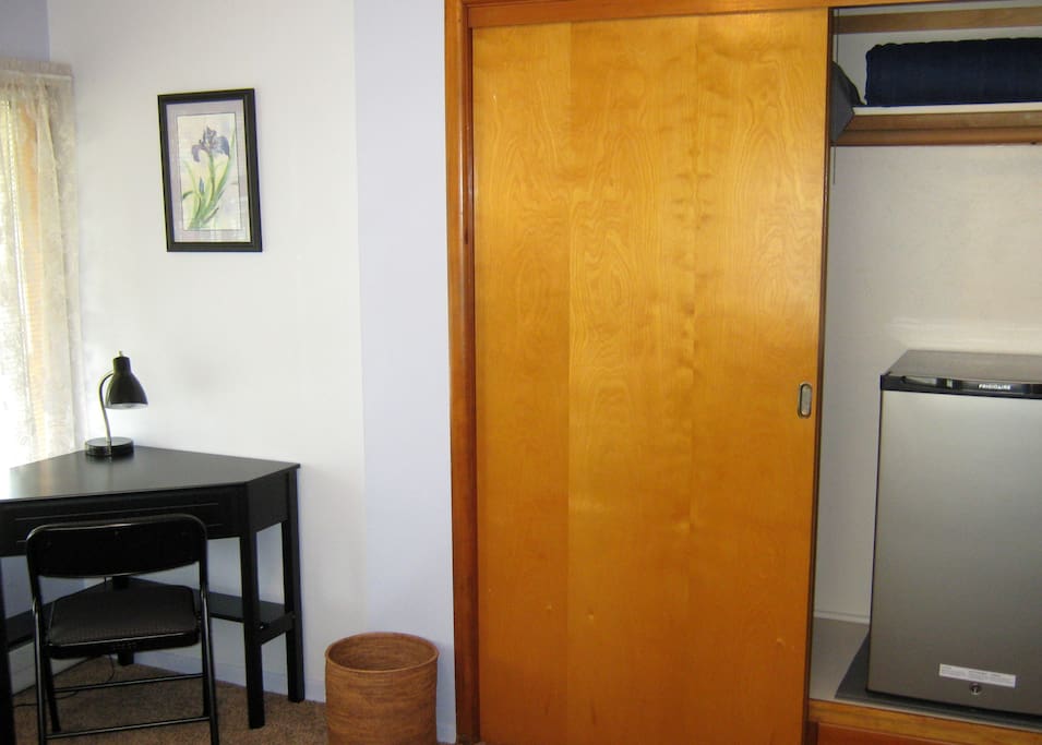 Large closet space along with mini-refrigerator. For overflow refrigeration needs there is space in the kitchen refrigerator too.