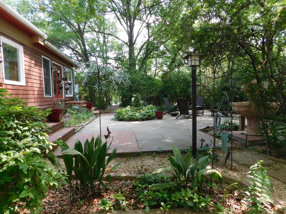 The slate patio offers a great area to relax in the garden.