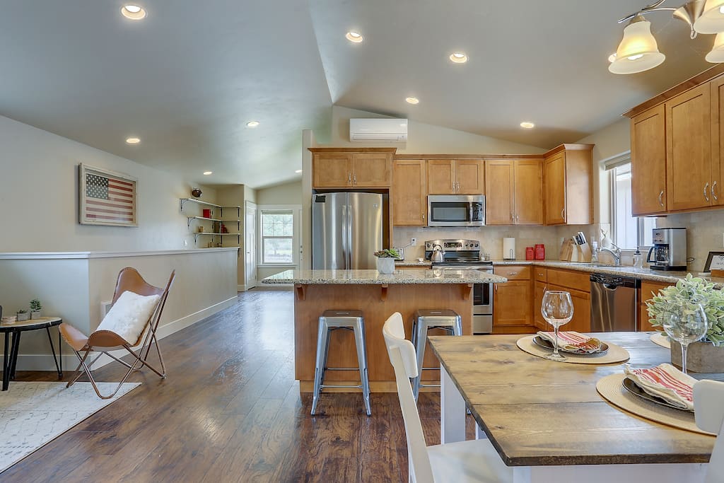 Full kitchen amenities; coffee maker, full range, dish washer. Tons of plates, cups, bowls, utensils, pans, and every cooking accessory you could imagine. Including coffee!