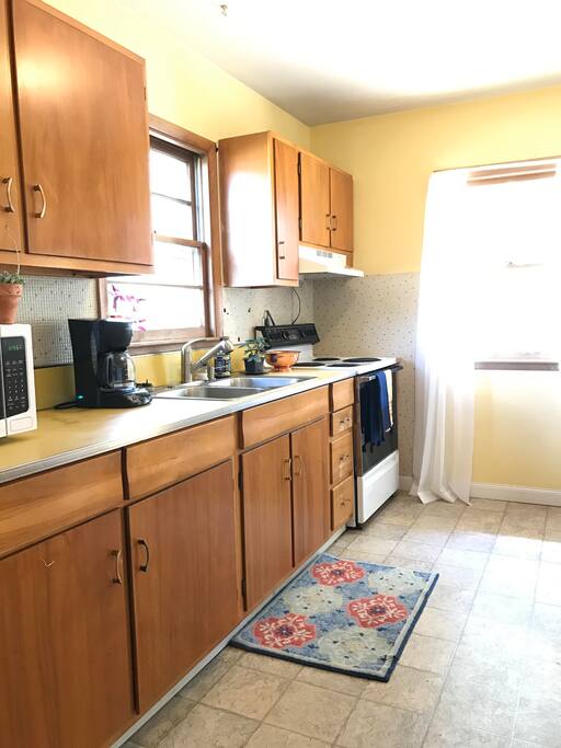 Wake up to the sunny yellow kitchen; plenty of tea and coffee to go around!