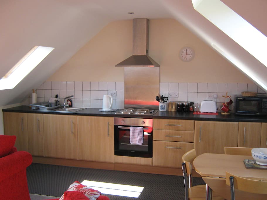 Fully fitted kitchen with built under oven / hob / fridge freezer / microwave.