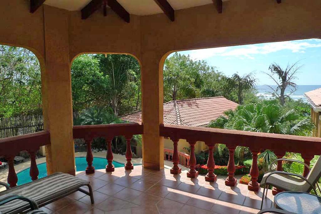 Balcony overlooking private pool