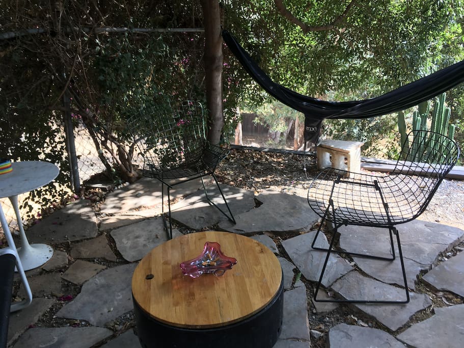 Little patio facing the expansive backyard. Be our guest and hang out in the swing down at the bottom, or enjoy the view of Debs and mt washington hillside