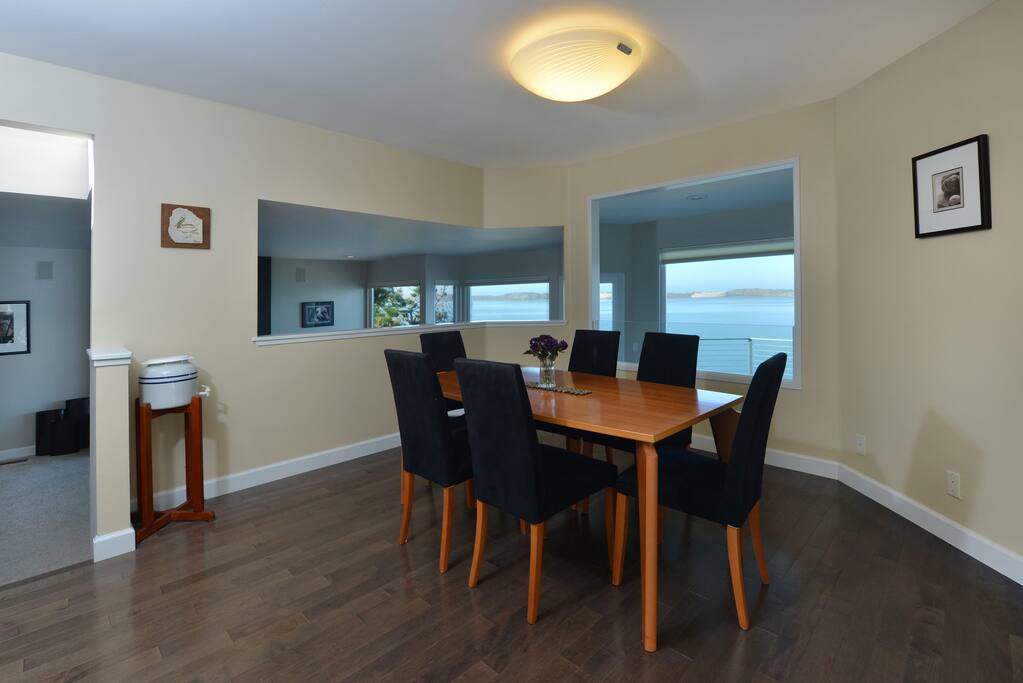 The dining area is open to the kitchen and living area and enjoys the same views