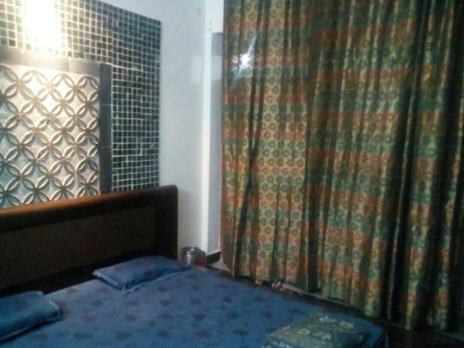 the bed room in the private apartment