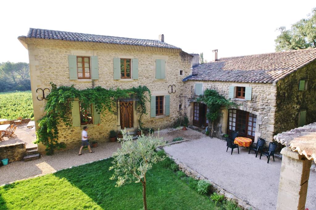 The shared courtyard , with rental house on the right.