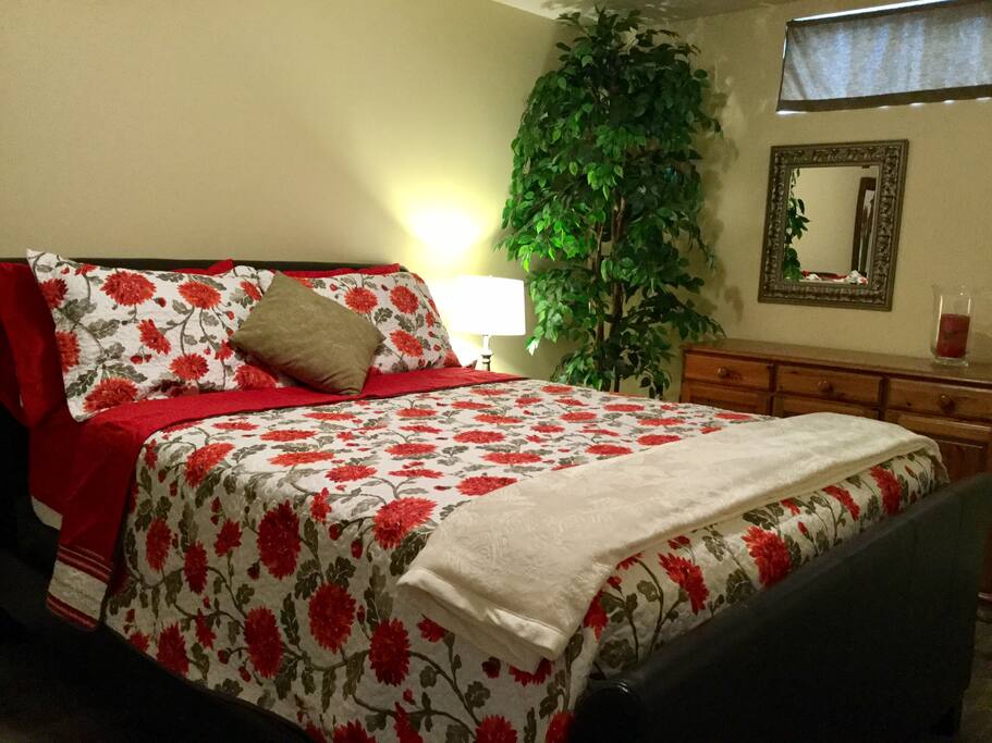 Large bedrooms with Queen bed, dresser and closet