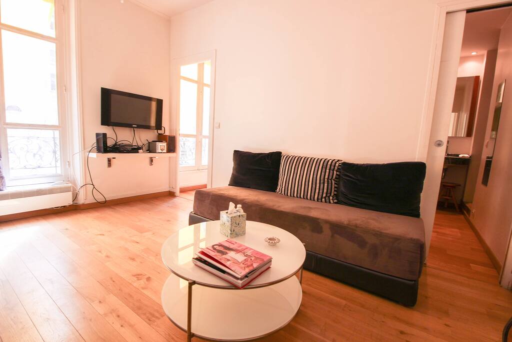 Living room with flat screen TV, couches