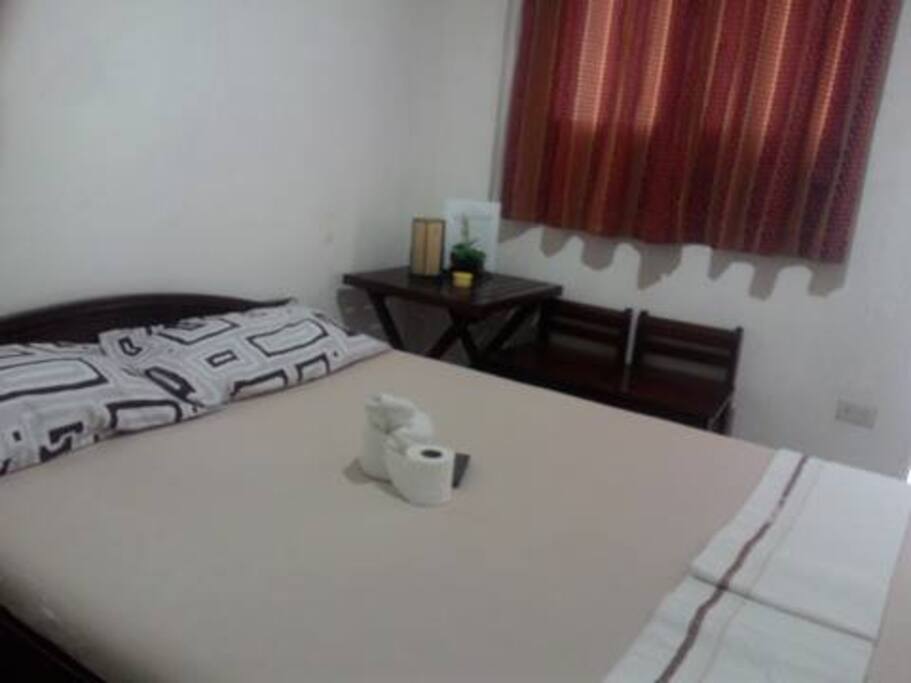 small coffee table on the bedside