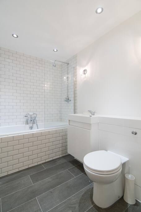 Brand new bathroom with power shower. Towels provided.