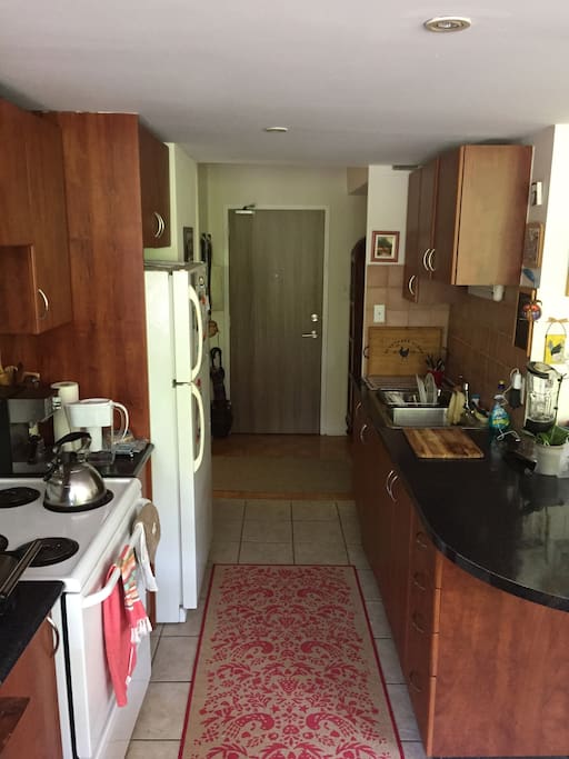 Kitchen with all appliances included (blender, panini press, espresso machine, etc)