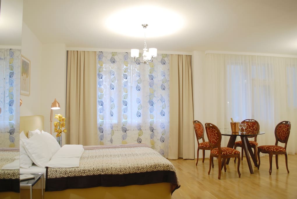The main room is very spacious, with a big bed, convertable single bed, waredrobe and a dining table.
