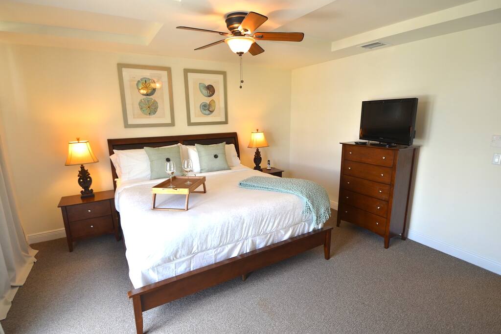 Spacious (Private) Master Bedroom (King Bed) Offers LED HD Television, Balcony Terrace Overlooking Pool Lounge + En Suite Bathrooms...