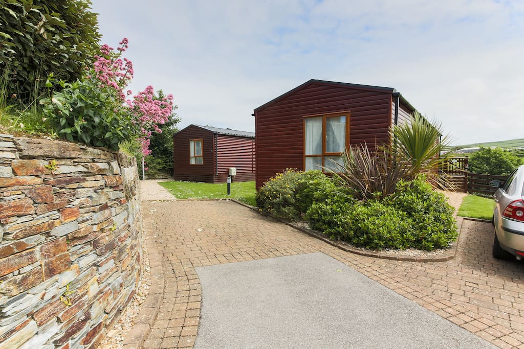 14 Bossiney Bay with one allocated parking space on the right as you approach the lodge