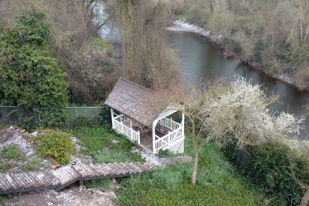 Gazebo and steps to the river. Hail from a rare storm.