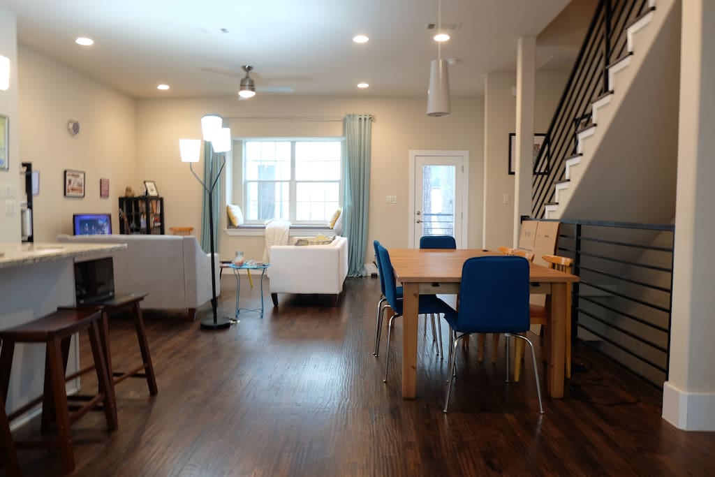 Shared living area includes two couches, cozy window seat, and TV with access to netflix/amazon instant video