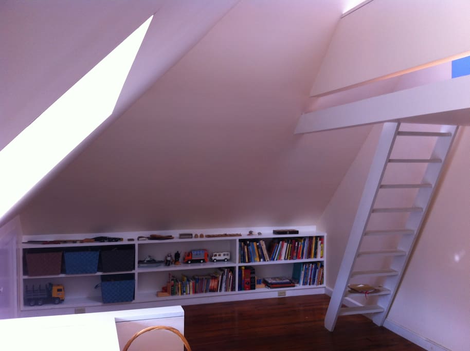This is our third floor which has two bedrooms, a brand-new bathroom, and a loft with a skylight.