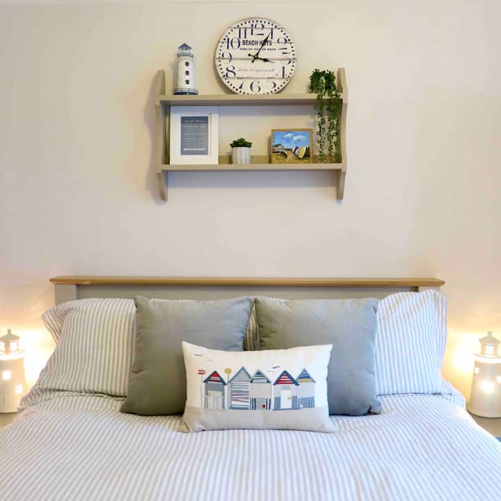 Bedroom Two has a king size bed with an Emma Hybrid mattresses, wardrobe, chest of drawers, bedside tables and a 32" smart TV with built in DVD player.