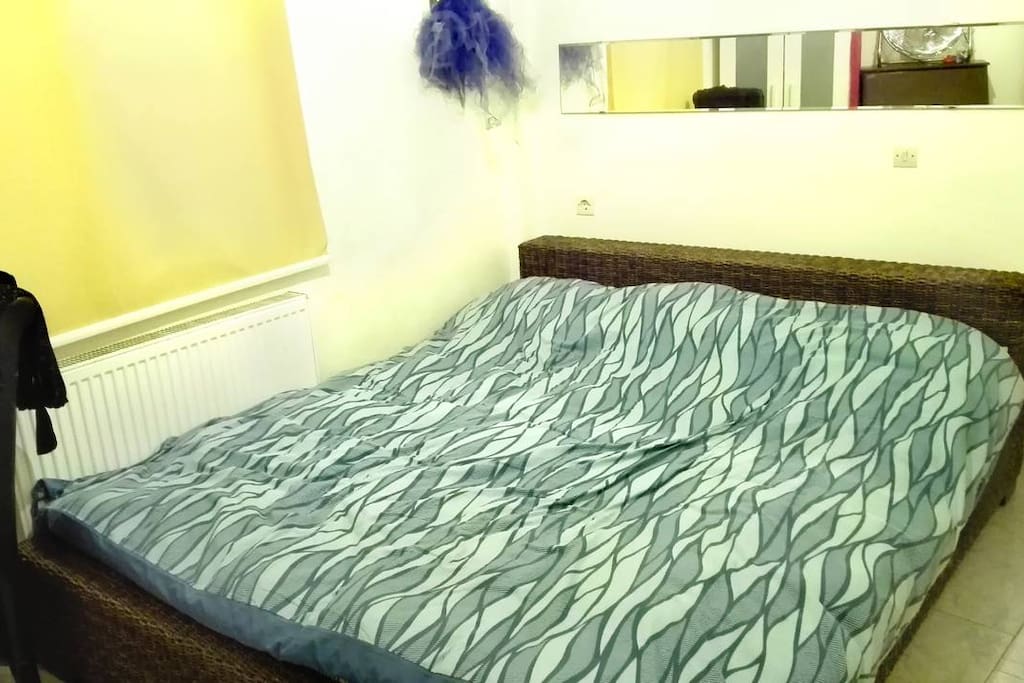 the king size bed in the bedroom