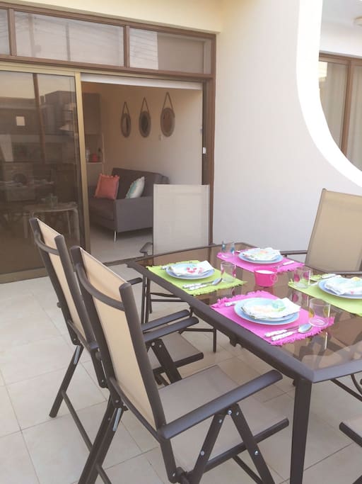 Large outdoor veranda with table and chairs for 6 plus umbrella - sea view