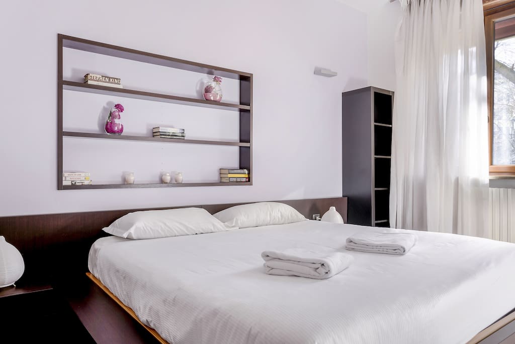 The Bedroom - The comfortable double bed with soft bed-linen and towels