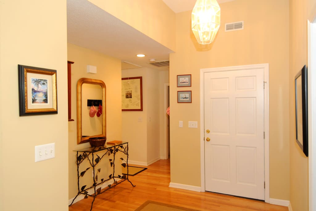 FRONT HALL
Wide entrance will table and basket to organize keys when entering.