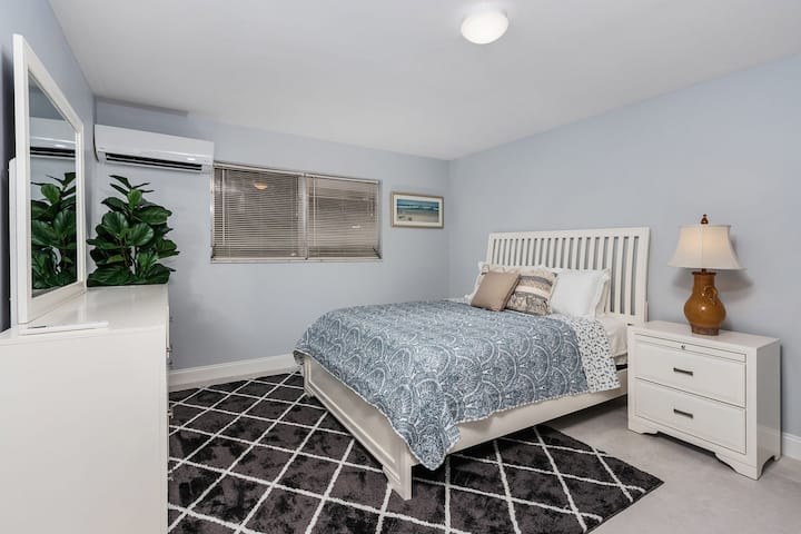 Guest bedroom with queen bed and comfortable mattress and linens.