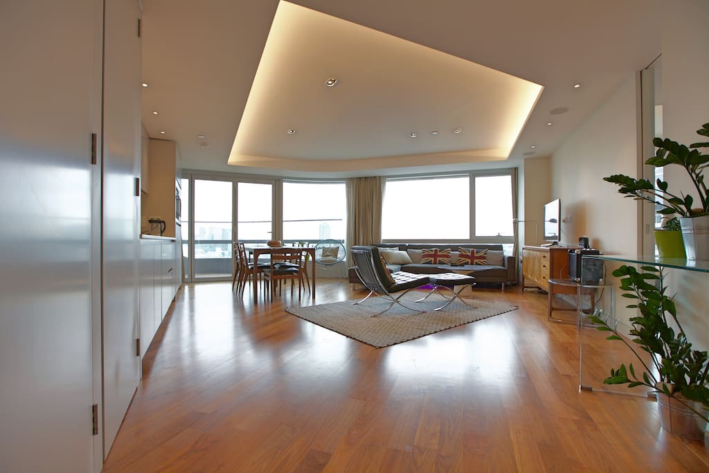 Living rom with a panorama view of city skyline