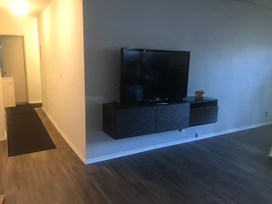 Living room/wrap around hallwway leading to bedrooms