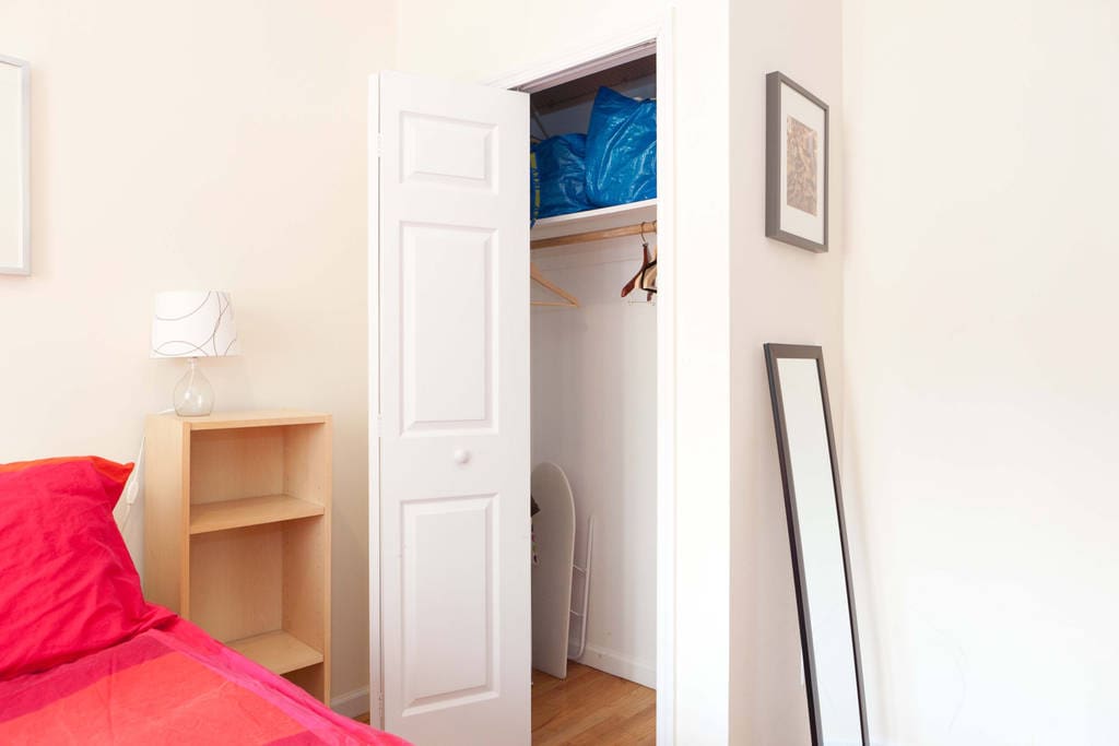 The bedroom features ample closet space.