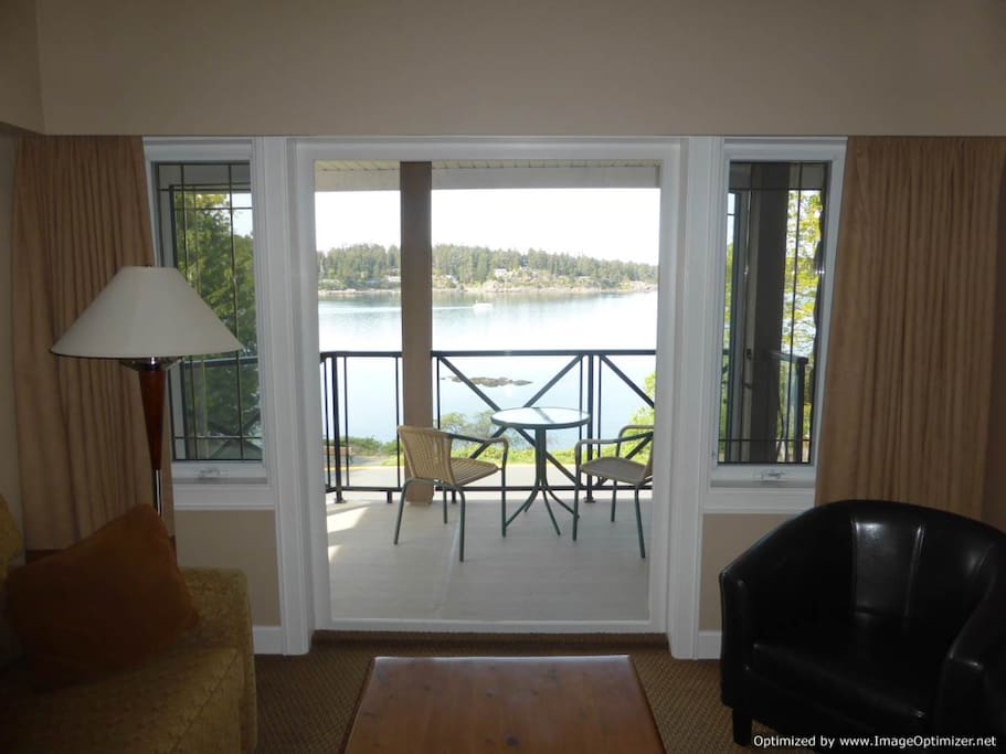 Enjoy a beautiful view from the living room or sit outside on the wrap around balcony