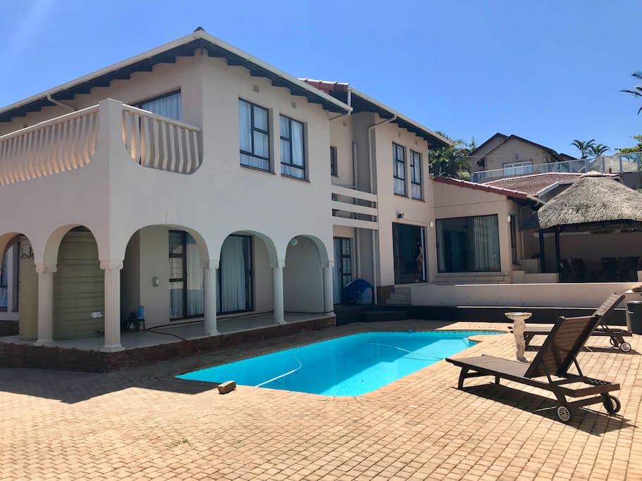 Facing the house from pool/entertainment area